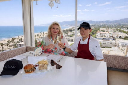 Chef Jhong Lee with Sophie Gayot and The Penthouse Restaurant's Dry‑Aged Wagyu Burger